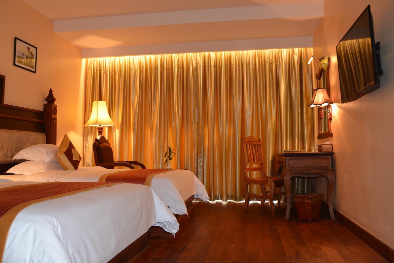 Bayon Era Hotel Siem Reap Bagian luar foto